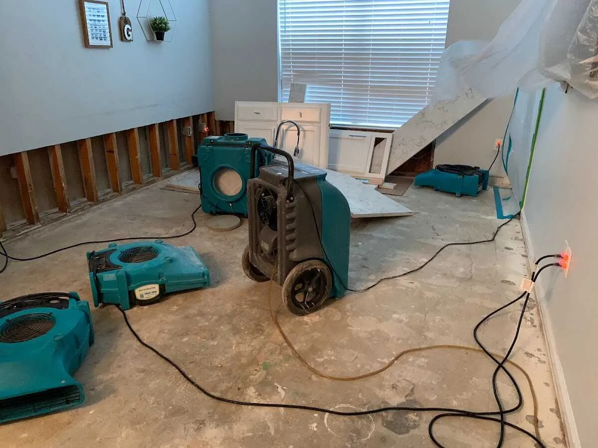 Dehumidifier in flood-cut room for Water Damage Restoration in Anderson